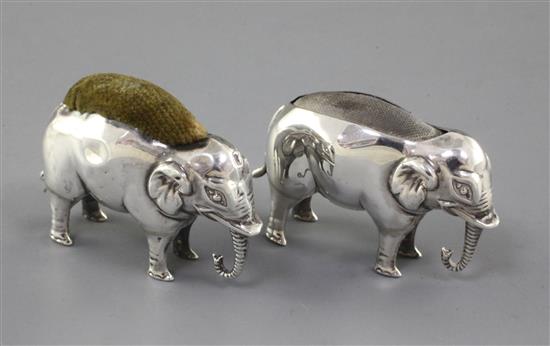 2 x elephant pin cushions.
